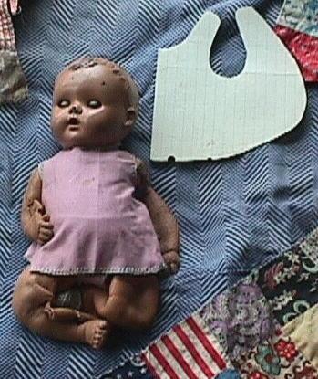 front view of baby-doll apron, with pattern