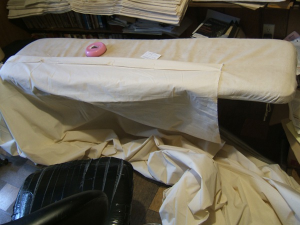  Sheet pinned to ironing board 