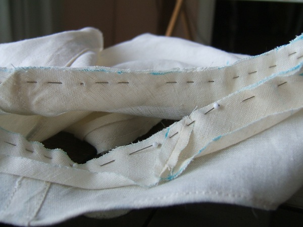 seam finger-pressed and tape pinned for sewing