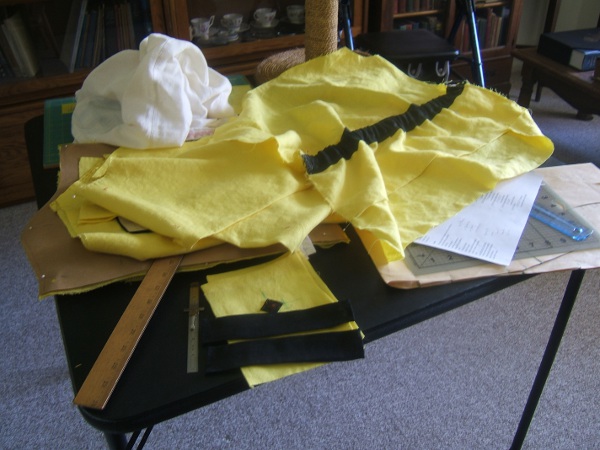 card table covered with undone work