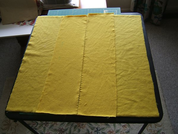Potential fronts on card table, hand basted