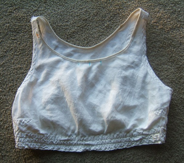 White Linen bra, mended, with wash-out marks