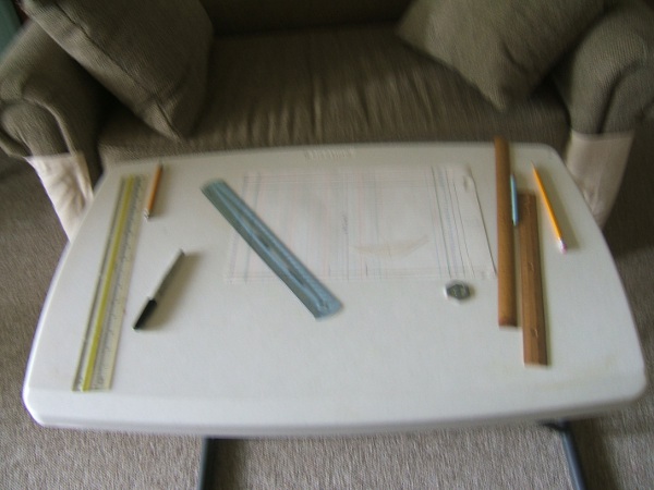 table with rulers and pencils