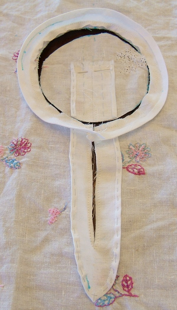 close-up of 
                     the stitching on the neck